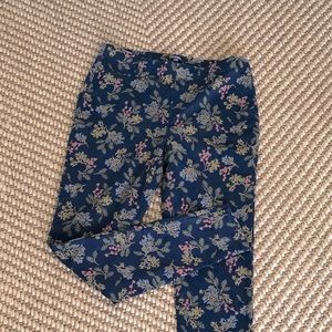 George jegging, floral pattern over blue background. Medium size